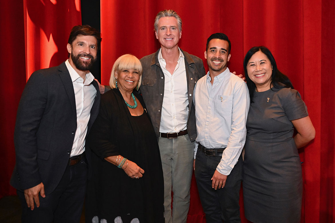 Members of the Advocacy Committee stand with Governor Newsom. (L to R: Sean Presant, Bobbi Banks, Eddie Bonin, and Chair Christina Lee Storm)