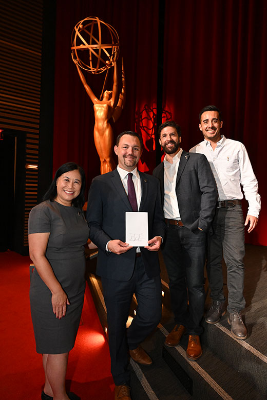 Members of the Advocacy Committee stand with Assemblymember Nick Schultz who introduced the bill. (L to R: Chair Christina Lee Storm, Asm. Nick Schultz, Sean Presant, and Eddie Bonin.)