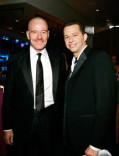 Actors Bryan Cranston (L) and Jon Cryer