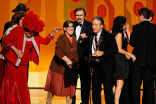 Presenters Jo Anne Worley, Ruth Buzzi, and Gary Owens and TV personality Jon Stewart