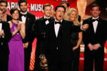 TV personality Stephen Colbert and the writing staff of 'The Colbert Report' 