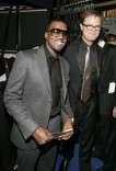 Recording artist Kanye West and actor Rainn Wilson
