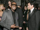 Musician Kanye West and actor Steve Carell backstage