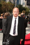 Louis C.K. arrives at the 61st Primetime Creative Arts Emmy Awards