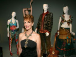 Erin Lareau, Costume Designer of Benise: Nights of Fire!, with her Emmy-winning collection.