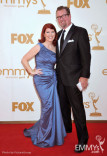 (L-R) Kate Flannery, Chris Haston arrives at the Academy of Television Arts &amp; Sciences 63rd Primetime Emmy Awards