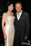 Julianna Margulies (L) and Mark Burnett backstage during the Academy of Television Arts &amp; Sciences 63rd Primetime Emmy Awards