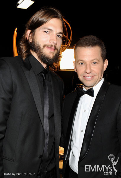 Ashton Kutcher (L) and Jon Cryer backstage during the Academy of Television Arts &amp; Sciences 63rd Primetime Emmy Awards