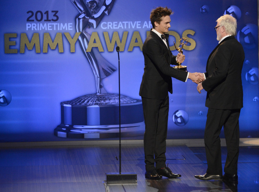 Rupert Friend presents Bill Groom with the award for Outstanding Art Direction For A Single-Camera Series for Boardwalk Empire 