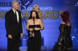 Todd Kleitsch, Deborah Lamia Denaver and Deborah Rutherford on stage at the 65th Creative Arts Emmys