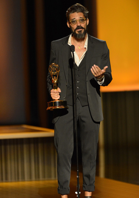 Alberto Mielgo accepts the award for Outstanding Individual Achievements in Animation for Disney TRON: Uprising