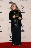June Foray poses with her Governors Award at the 65th Creative Arts Emmys