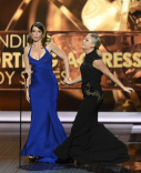 Tina Fey and Amy Poehler on stage at the 65th Emmys