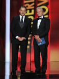 Matt Damon and Michael Douglas on stage at the 65th Emmys