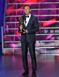 Mark Burnett accepts the award for Outstanding Reality-Competition Program