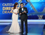 Carrie Preston and Dan Bucatinsky on stage at the 65th Emmys