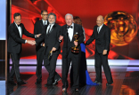 Jerry Weintraub and the producing team from "Behind the Candelabra" accept the award for Outstanding Miniseries or Movie at the 65th Emmys