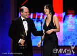 Writers Matthew Weiner (L) and Erin Levy speaks onstage at the 62nd Annual Primetime Emmy Awards held at the Nokia Theatre