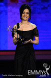 Actress Archie Panjabi accepts her award onstage at the 62nd Annual Primetime Emmy Awards held at the Nokia Theatre