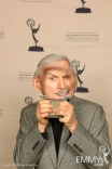 Dick Smothers with his Hall of Fame award.