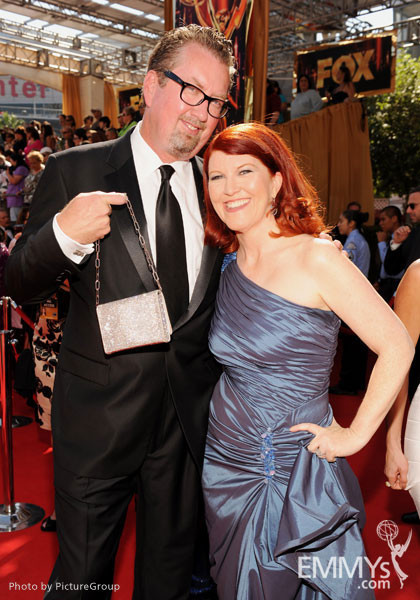Kate Flannery (R) and Chris Haston (L) arrive at the Academy of Television Arts &amp; Sciences 63rd Primetime Emmy Awards