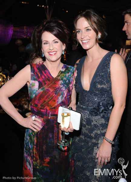 Megan Mullally (L) and Emily Blunt at the Governors Ball during the Academy of Television Arts &amp; Sciences 63rd Primetime Emmys