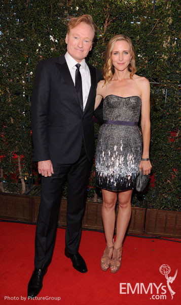 (L-R) Conan O'Brien and Liza Powel arrive at the Academy of Television Arts &amp; Sciences 63rd Primetime Emmy Awards