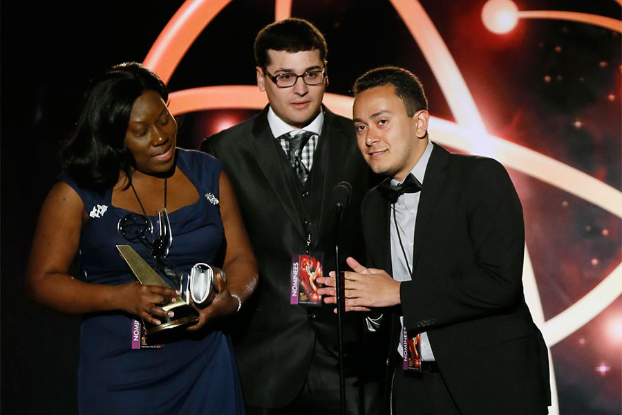 Nickesha Johnson, Anthony Tart, and Michael Gomez of Brooklyn College accept the award in the Newscast category for “Brooklyn College News Show 1" at the 35th College Television Awards