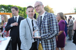 Writer Bradley Bredeweg and actor-producer-director Peter Paige celebrate their Television Academy Honors award for The Fosters at the seventh annual Honors ceremony in Beverly Hills, California.
