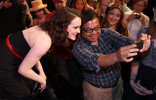 Sophie McShera poses with a fan.