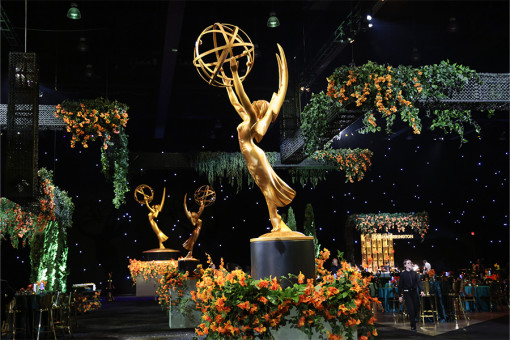 An Emmy statue glows under a spotlight at the 78th Emmy Awards post-show gala