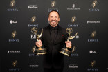 Jayson Dumenigo poses with his Emmy for the development of Action Factory’s Play’n with Fire Hydrogels