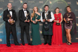 The team from The Traitors pose in the press room with the award for Outstanding Production Design for a Variety or Reality Series during night one of the 78th Emmy Awards