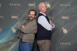 Mike C. Nelson, left, and Bill Glass pose in the press room during night one of the 78th Emmy Awards