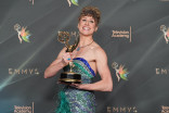 Kelly Lyon in the press room with their Emmy for Outstanding Picture Editing for Variety Programming for The Muppet Show during night one of the 78th Emmy Awards