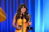 Linda Cardellini from DTF St. Louis accepts the Emmy for Outstanding Supporting Actress in a Limited or Anthology Series or Movie during night two of the 78th Emmy Awards