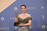 Kate O'Flynn is seen backstage with the Emmy for Outstanding Supporting Actress in a Comedy Series for Widow's Bay during the 78th Emmy Awards telecast