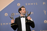 Matthew Rhys poses in the press room at the 78th Emmy Awards telecast