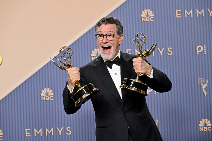 Stephen Colbert is seen backstage with the Emmy for Outstanding Variety Series during the 78th Emmy Awards telecast
