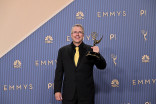Vince Gilligan poses in the press room with the Emmy for Outstanding Writing for a Drama Series for Pluribus episode We Is Us during the 78th Emmy Awards telecast