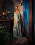 Katherine LaNasa in a light blue gown posing in the Emmy Photo Studio