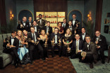 The cast and crew of The Late Show with Stephen Colbert holding their Emmy Awards