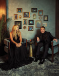 Michael J. Fox and Tract Pollan pose in the Emmy Photo Studio
