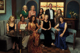 Television executives posing in the Emmy Photo Studio
