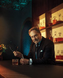 Stephen Root poses in a tuxedo in the Emmy Photo Studio