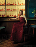 Taylor Dearden in a red gown in the Emmy Photo Studio
