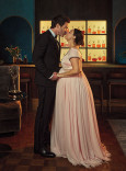 Tom Pelphrey and Kaley Cuoco share a kiss in the Emmy Photo Studio