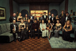 The cast and crew of Widow's Bay poses with their Emmy Awards
