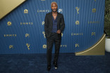 Scott Evans walks the red carpet at the 78th Emmy Awards telecast