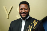 Luke Tennie walks the red carpet at the 78th Emmy Awards telecast
